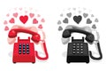 Ringing stationary phone with button keypad and with hearts Royalty Free Stock Photo