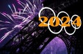 Rings and celebratory colorful fireworks over the Eiffel Tower in Paris (2024), France