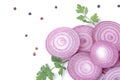 Rings of sliced red onions with herbs and spices on a white isolated background. vegetables. Royalty Free Stock Photo