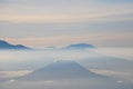 Rinjani Mountain Landscape and Cloude blue sky in the morning with fog and misty around the Valley. View from Bromo Mountain at Br Royalty Free Stock Photo