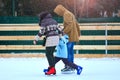 Rink. Family on a skating rink.