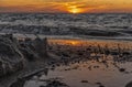 rinsed colored pebbles by the sea waves Royalty Free Stock Photo