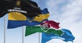 Conmebol Libertadores, Boca Juniors, and Fluminense flags waving on a clear day