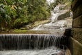 Beautiful waterfall called `Cascatinha Taunay` on green nature in the Atlantic Rainforest, Tijuca Forest National Park Royalty Free Stock Photo