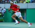 Olympic champion Rafael Nadal of Spain in action during men`s singles semifinal match of the Rio 2016 Olympic Games Royalty Free Stock Photo