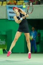 Professional tennis player Alize Cornet of France in action during women`s singles round 2 match of the Rio 2016 Olympic Games Royalty Free Stock Photo