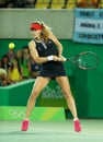 Professional tennis player Alize Cornet of France in action during women`s singles round 2 match of the Rio 2016 Olympic Games Royalty Free Stock Photo