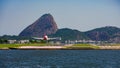 Commercial plane landing on the runway at Santos Dumont national airport