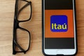 Rio de Janeiro, Brazil - December 22, 2019: Banco Itau logo on the mobile screen. It is the largest private bank in Brazil Royalty Free Stock Photo