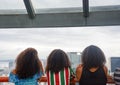 A group of brazilian teens looks at Rio`s downtown from