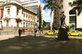 Rio de Janeiro, Brazil, July 14, 2017: Statue of the Carlos Gomes mastery and Rio de Janeiro City hall on background. Old buildin