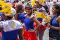 RIO DE JANEIRO, BRAZIL - Mar 03, 2014: Carnaval celebration in Rio with a girl in colourful outfit smiling and posing to the