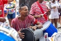 RIO DE JANEIRO, BRAZIL - Mar 03, 2014: Samba drummer playing and smiling during Carnaval Royalty Free Stock Photo