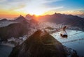 Aerial view of Rio de Janeiro at sunset with Urca and Sugar Loaf Cable Car and Corcovado mountain - Rio de Janeiro, Brazil Royalty Free Stock Photo