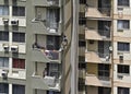 Worker repairing a building facade, Rio de Janeiro