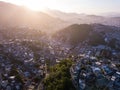 Rio de Janeiro city aerial view. Brazil. Houses on hills. Favela. Beautiful romantic sunset backlight
