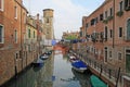 Rio de Sant'Ana in sestiere Castello with boats and colorful facades of old medieval houses in Venice, Italy Royalty Free Stock Photo