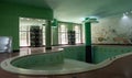 Retro swimming pool inside old luxurious hotel in Rio de Janeiro State Royalty Free Stock Photo