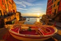 Riomaggiore city view, old village with colorful houses, sea and boats at sunset, Cinque Terre National Park, Liguria, Italy Royalty Free Stock Photo