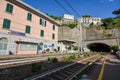 RIOMAGGIORE, ITALY - August 15, 2019: The train station and the train tracks at Riomaggiore at Cinque Terre Royalty Free Stock Photo