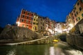 Riomaggiore town on Italian coastline at night in Cinque Terre, Italy