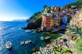 Riomaggiore - Village of Cinque Terre National Park at Coast of Italy. Beautiful colors at sunset. Province of La Spezia, Liguria Royalty Free Stock Photo