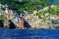 Riomaggiore - Village of Cinque Terre National Park at Coast of Italy. Beautiful colors at sunset. Province of La Spezia, Liguria Royalty Free Stock Photo