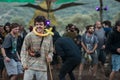 A man with a yellow ballon on his neck dance at the main stage of the Lost Theory psytransce music festival