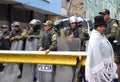 Riot Police and Civilian in Bolivia Royalty Free Stock Photo