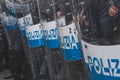 Riot police confronting the students in Milan, Italy