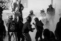 Riot police and protesters during a protest in front of Athens University