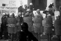 Riot police and protesters during a protest in front of Athens University
