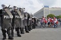 Riot police and soccer fans.