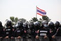 Riot police stand guard with shield to protect the government house Royalty Free Stock Photo