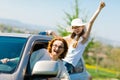 Rioters behind the wheel - female hooligans in the car Royalty Free Stock Photo