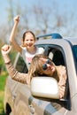 Rioters behind the wheel - female hooligans in the car Royalty Free Stock Photo