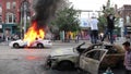 Rioters jump and set police cars on fire - HD 1080p