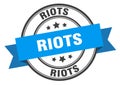 riots label sign. round stamp. band. ribbon