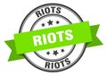 riots label sign. round stamp. band. ribbon