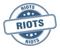 riots stamp. riots label. round grunge sign
