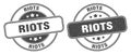 Riots stamp. riots label. round grunge sign