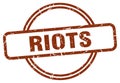 riots stamp. riots round vintage grunge label.