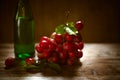 Rip of red grapes on a wooden textural