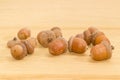Ripe acorns on a oak planks closeup Royalty Free Stock Photo