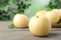 Ripe apple pears on wooden table against blurred background. Space for text Royalty Free Stock Photo