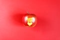 Apple with words I LOVE YOU on red background Royalty Free Stock Photo