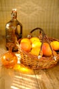 ripe apples in basket, bottle of cider, apple juice, rustic table flooded with warm sunlight, concept harvest, abundance, natural