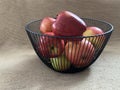 Ripe apples in a fruit bowl. Red, ripe apple in a metal vase