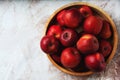 Ripe apples Starking in the wooden bowl