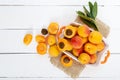 Ripe apricots in a ceramic bowl on a white background Royalty Free Stock Photo